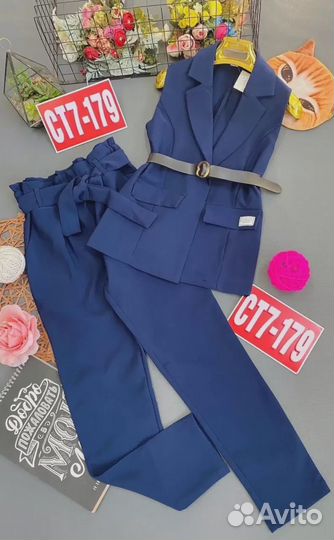 Школьный костюм для девочки 140р