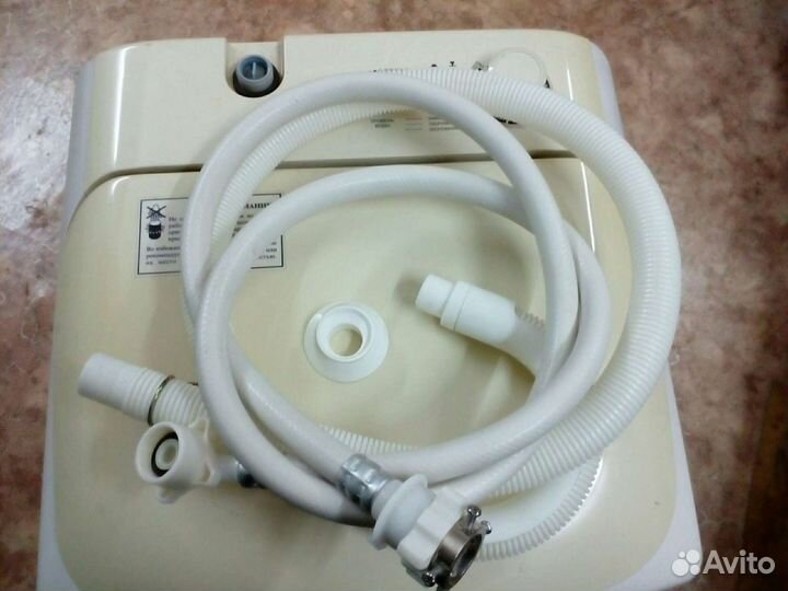 Стиральная машина с вертикальной загрузкой