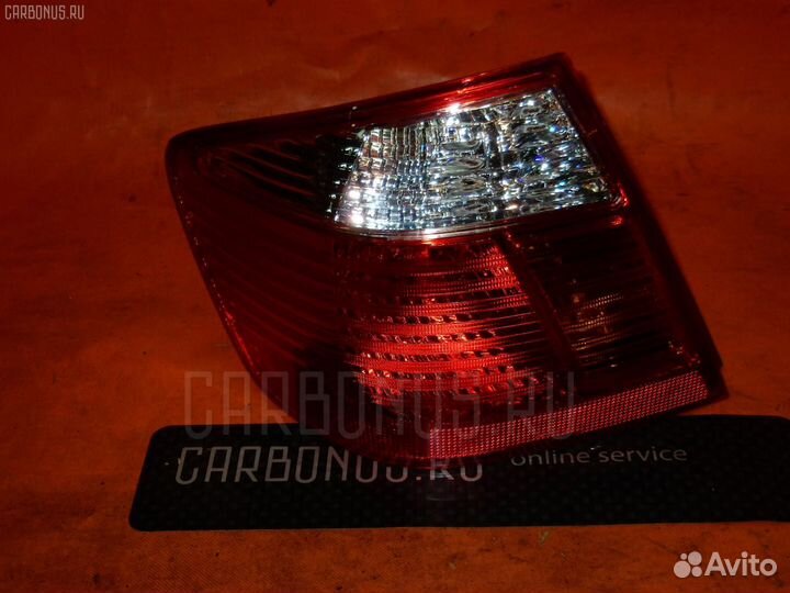 Фонарь левый Toyota Premio ZZT240