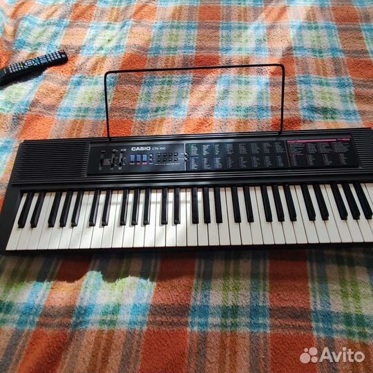 Электронный музыкальный синтезаторCasio