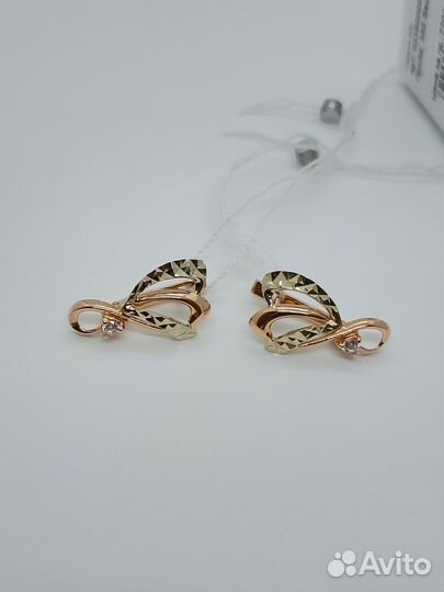 Золотые серьги с камнем