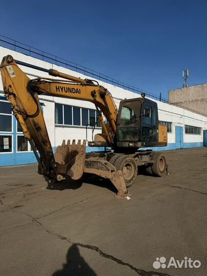 Колёсный экскаватор Hyundai R140W-7, 2010