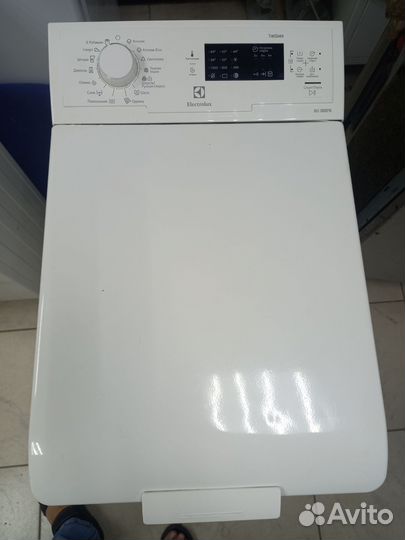 Стиральная машина с вертикальной загрузкой