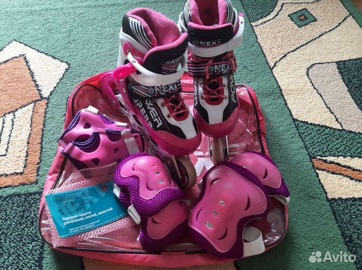 Роликовые коньки