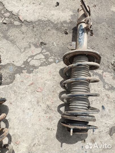 Передняя правая стойка Geely Emgrand EC7