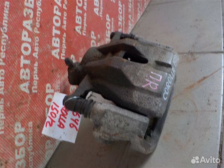 Суппорт тормозной передний правый Toyota Corolla