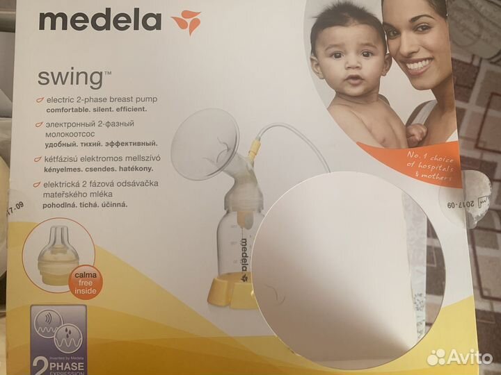 Молокоотсос medela электрический
