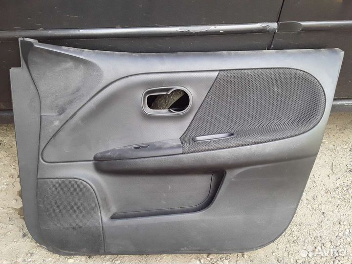 Обшивка правой передней двери nissan note