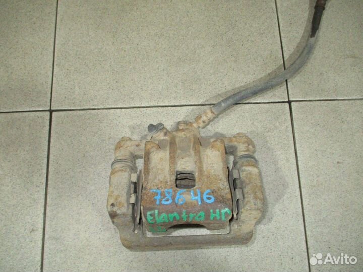 Суппорт задний левый Hyundai Elantra 4 (HD)