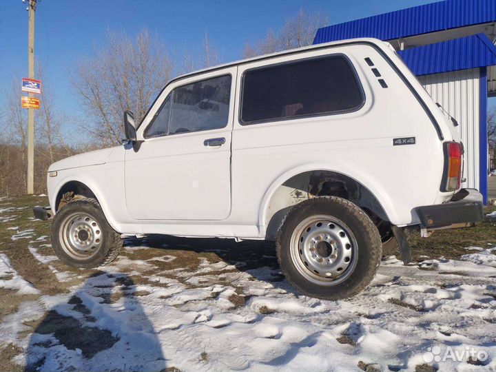 Передняя балка рычаги на ниву 21213