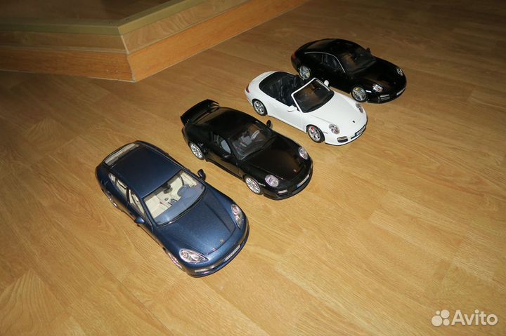 Модели 1:18 Porsche Norev