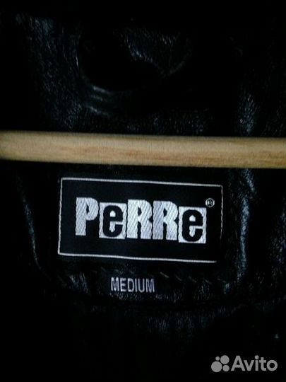 Полушубок из стриженой цигейки с кожаной отделкой