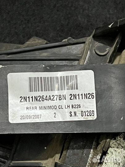 Замок задний левый Ford Fusion рестайлинг