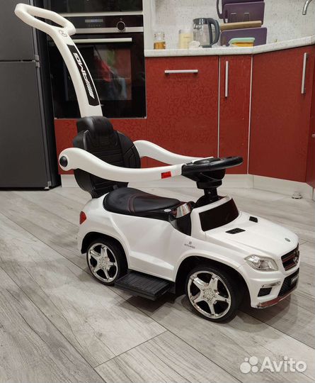 Машинка каталка толокар