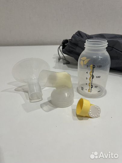 Электрический молокоотсос medela swing