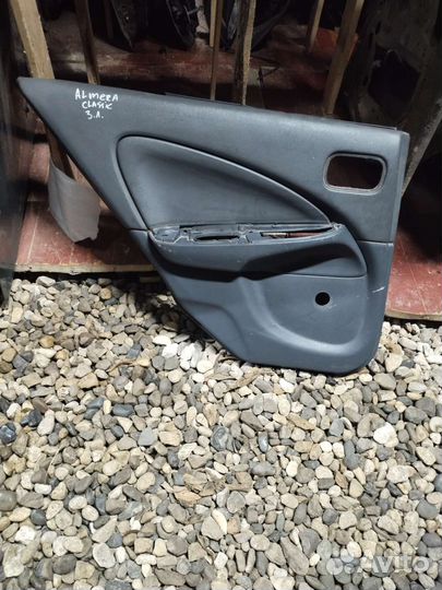 Обшивка двери зад. лев. Nissan Almera Classic B10