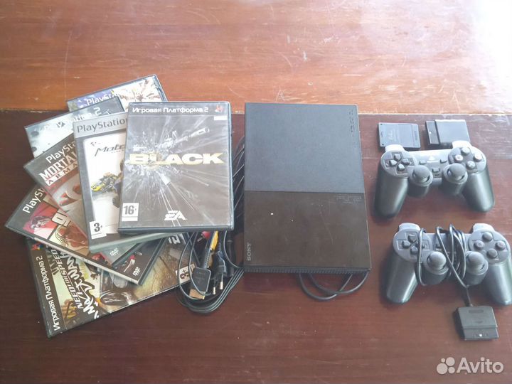 Sony PS2 прошитая (49 дисков)