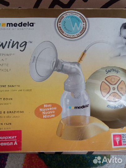 Молокоотсос medela электрический