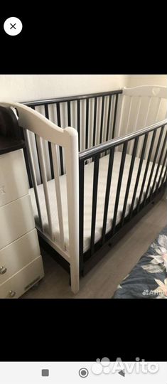 Детская кроватка с продольным маятником