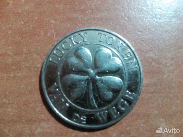 Жетоны метрополитена и игровой жетон