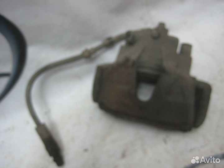 Суппорт тормозной передний правый Opel Astra H