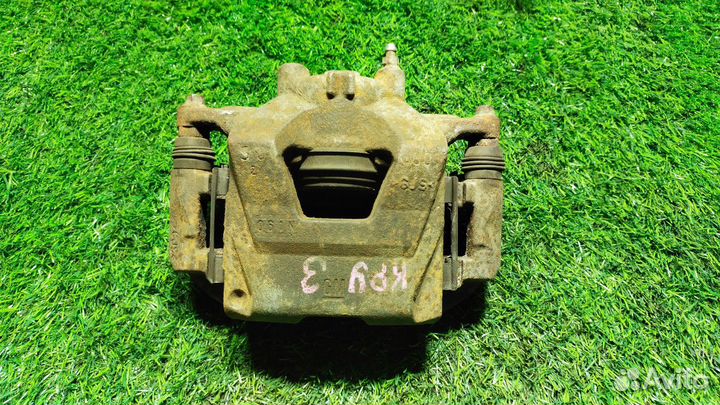 Суппорт тормозной передний левый Chevrolet Cruze