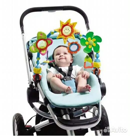 На коляску игрушка дуга Тини лове