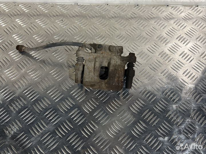 Тормозной суппорт задний mitsubishi lancer 10