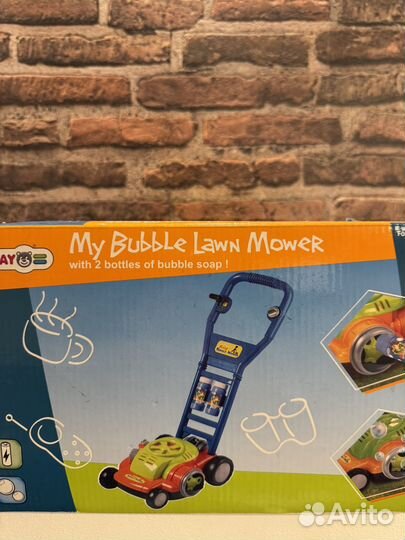 Игрушка газонокосилка