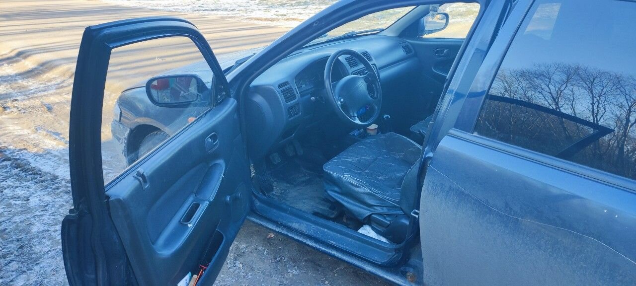 Mazda 323: фото владельца