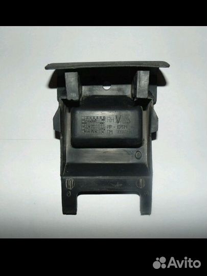 Opel Astra - заглушка поддомкратника