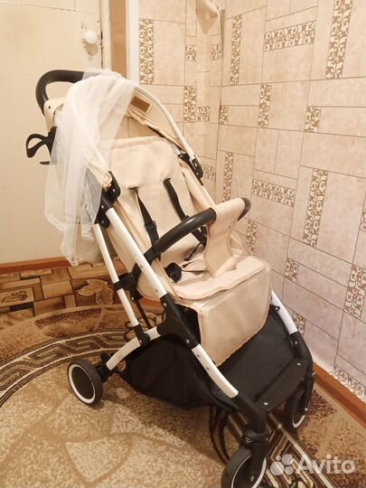 Продам прогулочную коляску KariKids