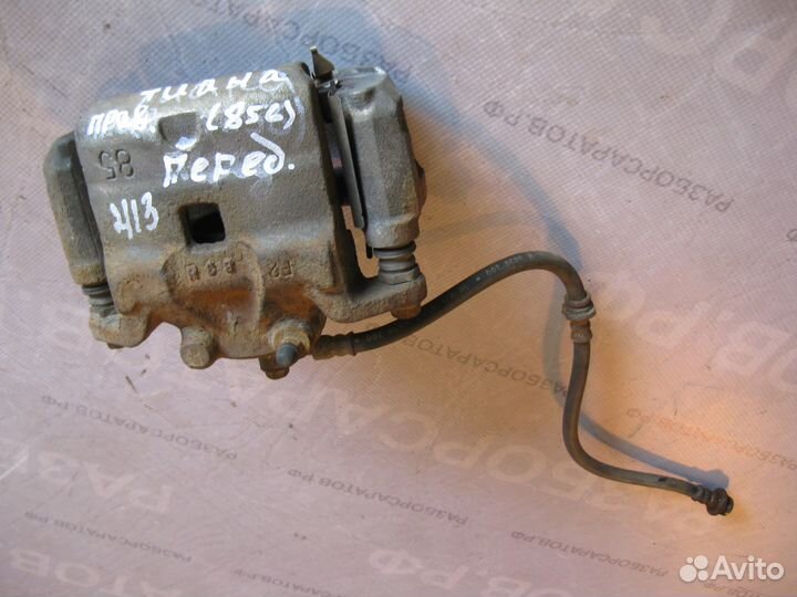 Суппорт тормозной передний Ниссан Теана J32