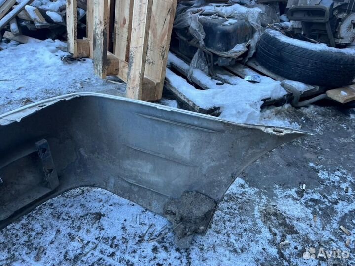 Бампер задний Mazda Familia BJ