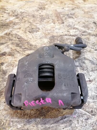 Суппорт тормозной передний левый Ford Fiesta MK5