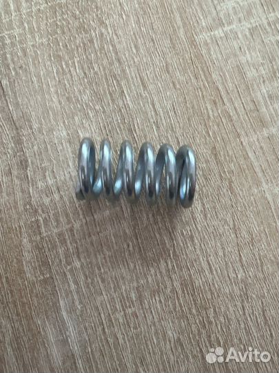 Пружина крепления глушителя