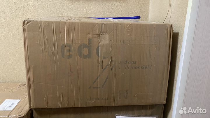 Коробка с детской одеждой