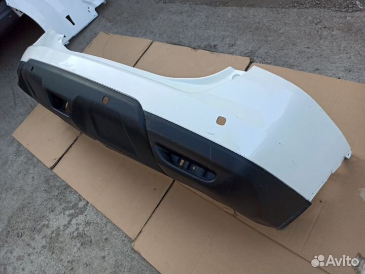 Бампер задний Ниссан Х-Траил белый