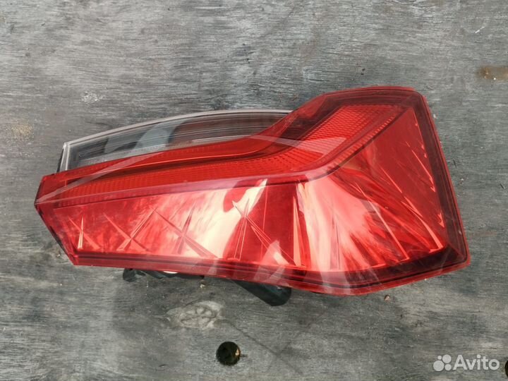 Фонарь задний наружный левый Skoda Rapid