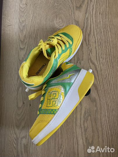 Продам кроссовки с роликами