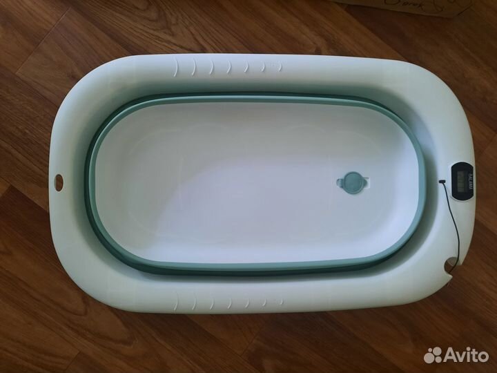 Новая ванночка для купания новорожденного