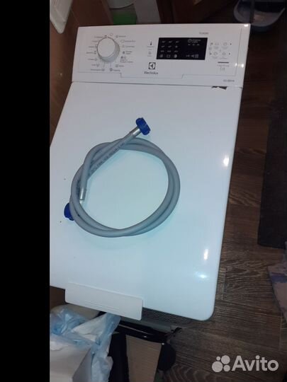 Стиральная машина с вертикальной загрузкой