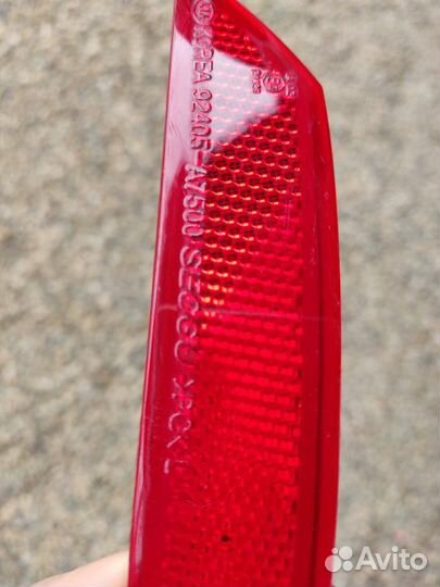 Отражатель в бампер задний левый Kia Cerato 3