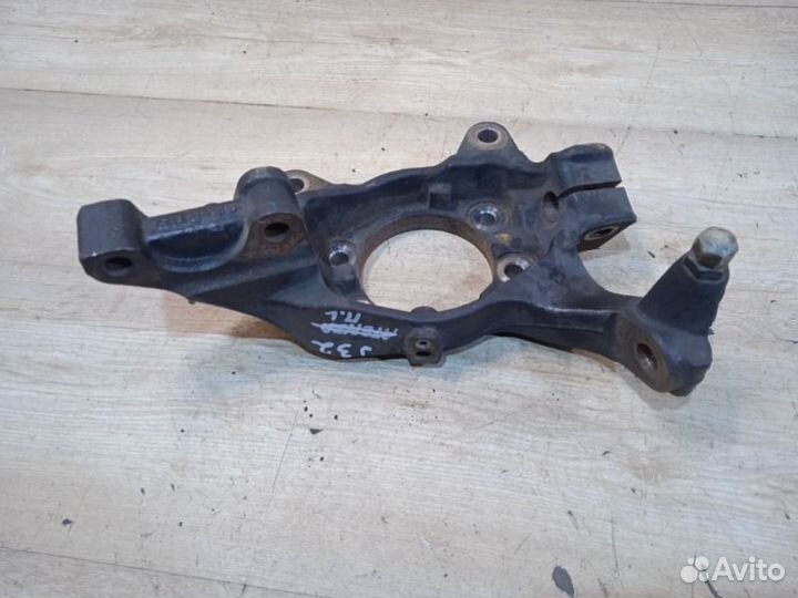 Кулак поворотный передний левый Nissan Teana J32