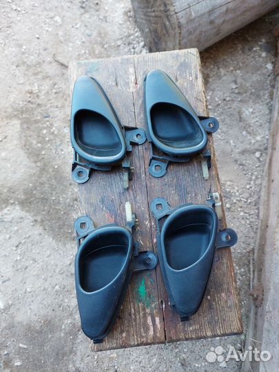 Внутренняя дверная ручка Нива Шевроле