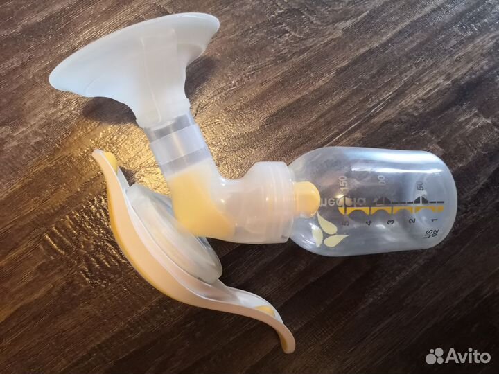 Молокоотсос medela ручной