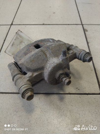 Суппорт тормозной передний правый Kia Picanto 1