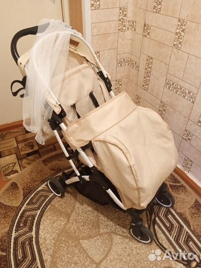 Продам прогулочную коляску KariKids
