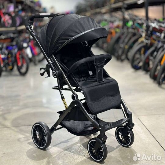 Прогулочная коляска с перекидной ручкой новая