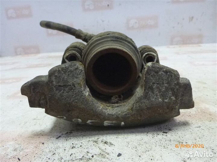 Суппорт передний левый Volkswagen Golf MK2 RF 1988